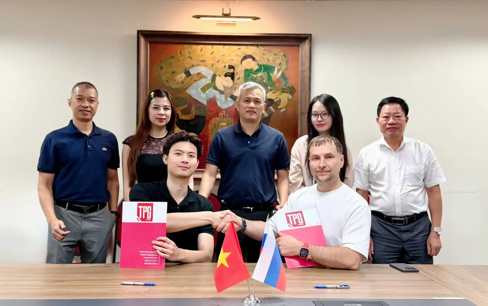 TPG TECH and SIGNAX teams at their partnership signing in Hanoi